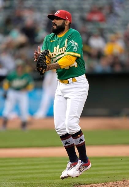 Sergio Romo of the Oakland Athletics pitches against the Boston Red Sox in the top of the 10th inning at RingCentral Coliseum on July 03, 2021 in...