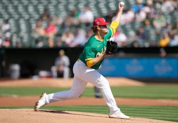 Cole Irvin of the Oakland Athletics pitches against the Boston Red Sox in the top of the first inning at RingCentral Coliseum on July 03, 2021 in...