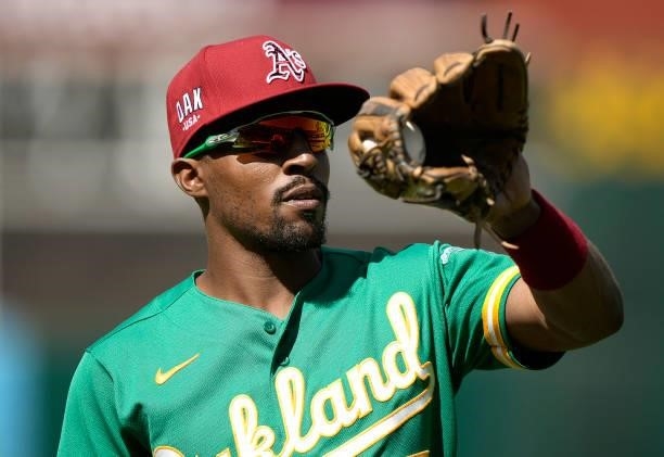 Tony Kemp of the Oakland Athletics warms up prior to the start of the game against the Boston Red Sox at RingCentral Coliseum on July 03, 2021 in...