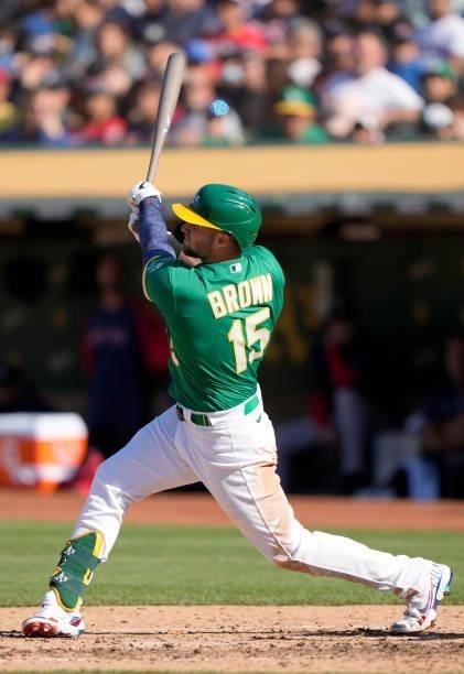 Seth Brown of the Oakland Athletics bats against the Boston Red Sox in the bottom of the fourth inning at RingCentral Coliseum on July 03, 2021 in...