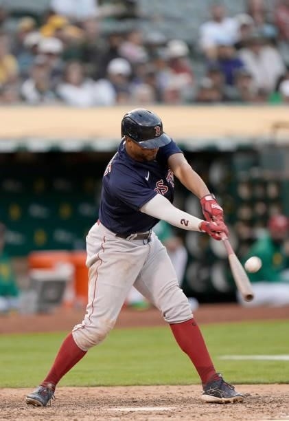 Xander Bogaerts of the Boston Red Sox bats against the Oakland Athletics in the top of the 11th inning at RingCentral Coliseum on July 03, 2021 in...