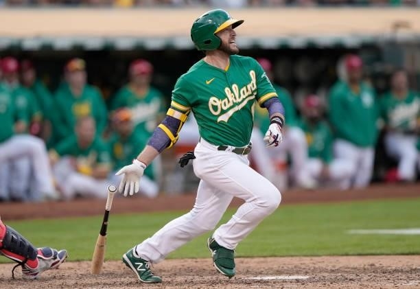 Jed Lowrie of the Oakland Athletics bats against the Boston Red Sox in the bottom of the 10th inning at RingCentral Coliseum on July 03, 2021 in...
