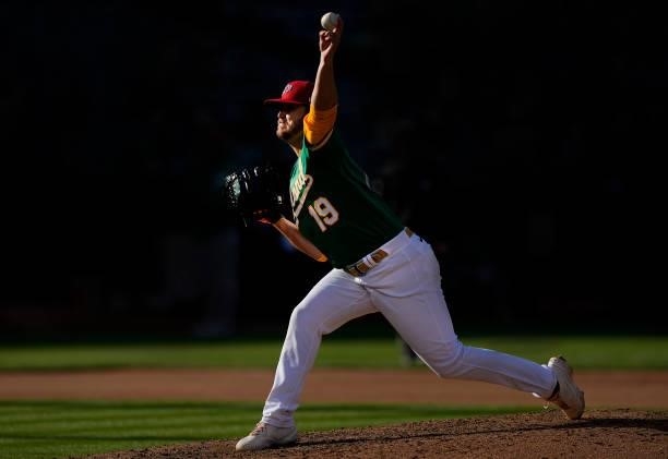 Cole Irvin of the Oakland Athletics pitches against the Boston Red Sox in the top of the seventh inning at RingCentral Coliseum on July 03, 2021 in...
