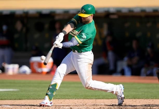 Seth Brown of the Oakland Athletics bats against the Boston Red Sox in the bottom of the fourth inning at RingCentral Coliseum on July 03, 2021 in...