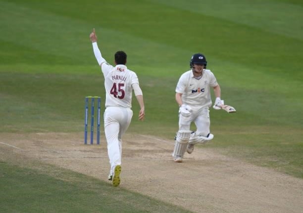 Wayne Parnell of Northamptonshire celebrates taking the wicket of Dom Bess of Yorkshire during the LV= Insurance County Championship match between...