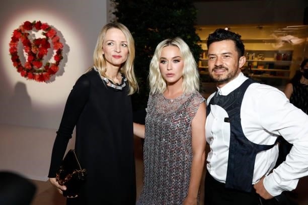 Delphine Arnault, Katy Perry and Orlando Bloom attend the Louis Vuitton Parfum Dinner at Fondation Louis Vuitton on July 05, 2021 in Paris, France.