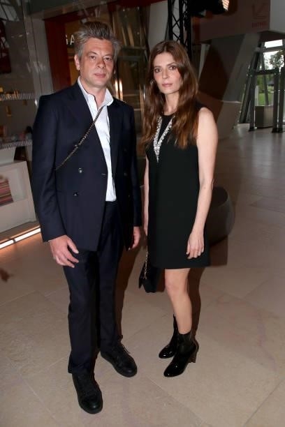 Benjamin Biolay and Chiara Mastroianni attend Louis Vuitton Parfum hosts dinner at Fondation Louis Vuitton on July 05, 2021 in Paris, France.