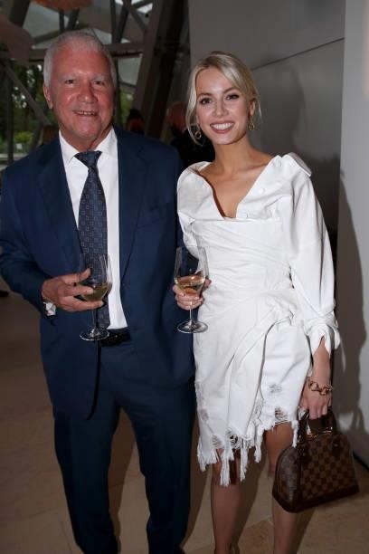 Galerist Larry Gagosian and a guest attend Louis Vuitton Parfum hosts dinner at Fondation Louis Vuitton on July 05, 2021 in Paris, France.