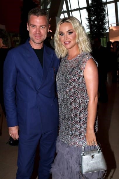 Katy Perry and a guest attend Louis Vuitton Parfum hosts dinner at Fondation Louis Vuitton on July 05, 2021 in Paris, France.