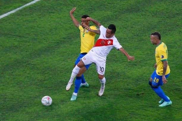 Danilo da Silva of Brazil competes for the ball with Christian Cueva of Peru during a semi-final match of Copa America Brazil 2021 between Brazil and...