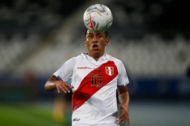 Christian Cueva of Peru looks at the ball during a semi-final match of Copa America Brazil 2021 between Brazil and Peru at Estadio Olímpico Nilton...