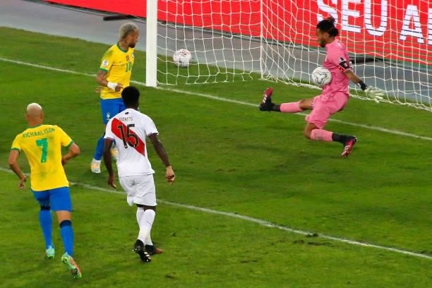 Pedro Gallese goalkeeper of Peru makes a save during a semi-final match of Copa America Brazil 2021 between Brazil and Peru at Estadio Olímpico...