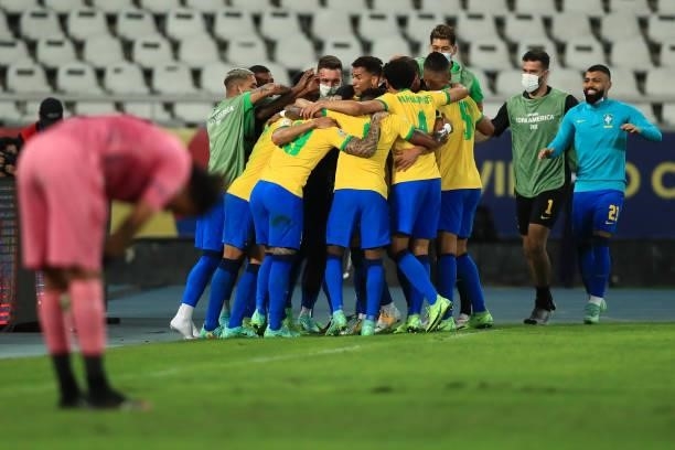 Lucas Paqueta of Brazil celebrates with teammates after scoring the first goal of his team during a semi-final match of Copa America Brazil 2021...