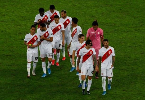Gianluca Lapadula and Sergio Peña of Peru talk as leaving the pitch at the end of the first half during a semi-final match of Copa America Brazil...