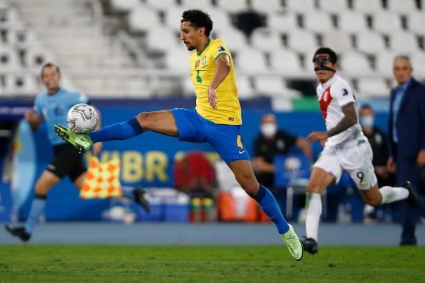 Marquinhos of Brazil controls the ball during a semi-final match of Copa America Brazil 2021 between Brazil and Peru at Estadio Olímpico Nilton...