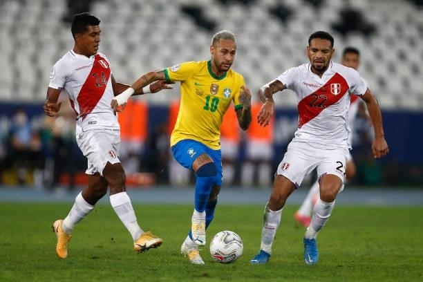 Neymar Jr. Of Brazil competes for the ball with Raziel García and Alexander Callens of Peru during a semi-final match of Copa America Brazil 2021...
