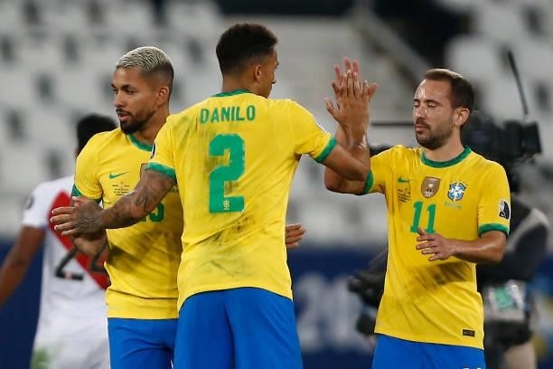 Danilo da Silva of Brazil celebrates with teammate Everton Ribeiro after winning a semi-final match of Copa America Brazil 2021 between Brazil and...