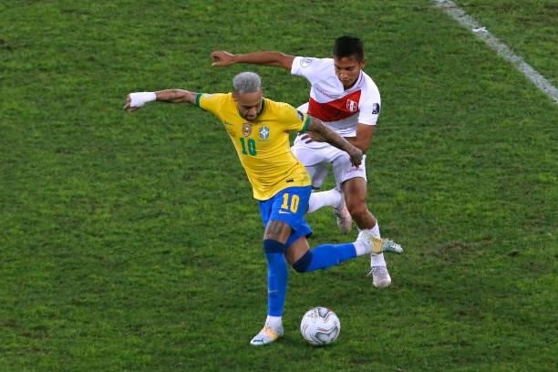 Neymar Jr. Of Brazil competes for the ball with Gerald Távara of Peru during a semi-final match of Copa America Brazil 2021 between Brazil and Peru...