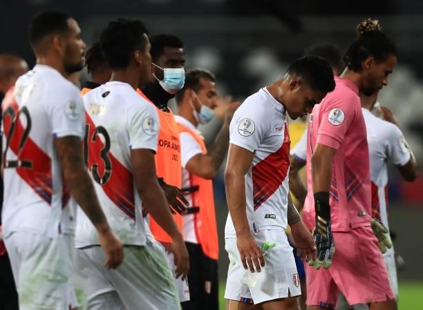 Pedro Gallese goalkeeper of Peru and his teammates react after losing a semi-final match of Copa America Brazil 2021 between Brazil and Peru at...