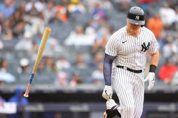 Luke Voit of the New York Yankees slams his bat against the New York Mets during a game at Yankee Stadium on July 3, 2021 in New York City.
