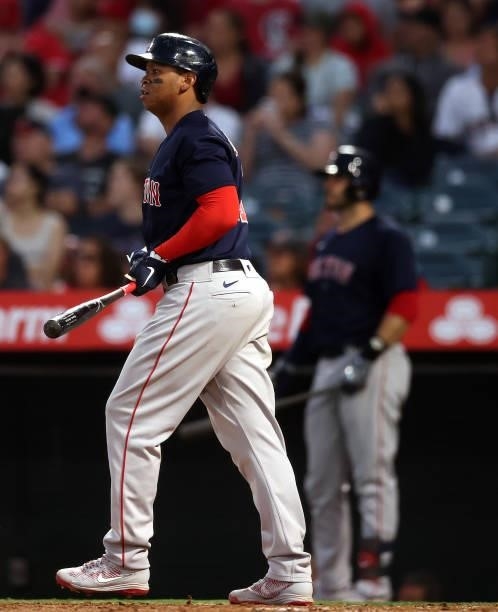 Rafael Devers of the Boston Red Sox hits a two-run home run against the Los Angeles Angels in the fourth inning at Angel Stadium of Anaheim on July...