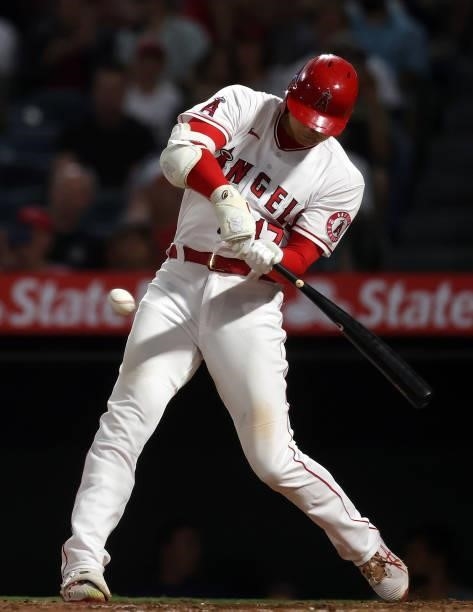Shohei Ohtani of the Los Angeles Angels hits a single against the Boston Red Sox in the fifth inning at Angel Stadium of Anaheim on July 05, 2021 in...