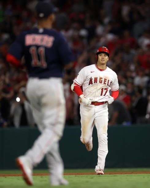 Shohei Ohtani of the Los Angeles Angels runs off the field after grounding out against the Boston Red Sox in the ninth inning at Angel Stadium of...