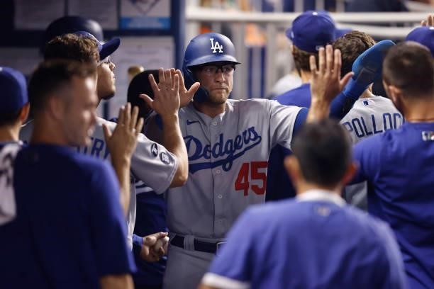 Matt Beaty of the Los Angeles Dodgers reacts after scoring a run during the eighth inning against the Miami Marlins at loanDepot park on July 05,...