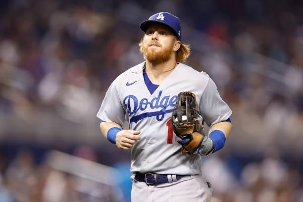 Justin Turner of the Los Angeles Dodgers looks on against the Miami Marlins at loanDepot park on July 05, 2021 in Miami, Florida.