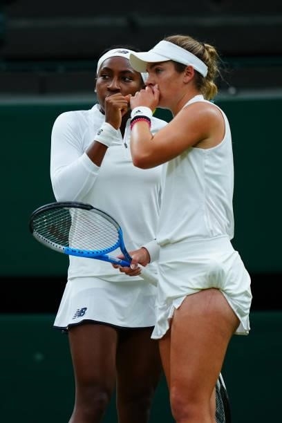 Coco Gauff and Caty McNally of The United States discuss tactics in their Ladies' Doubles Third Round match against Veronika Kudermetova and Elena...