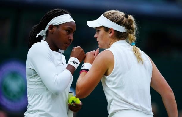 Coco Gauff and Caty McNally of The United States interact in their Ladies' Doubles Third Round match against Veronika Kudermetova and Elena Vesnina...