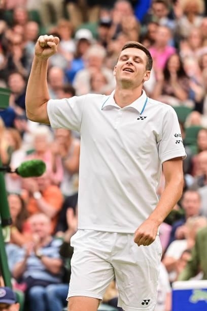 Hubert Hurkacz of Poland celebrates his victory over Daniil Medvedev of Russia in the fourth round of the gentlemen's singles during Day Eight of The...