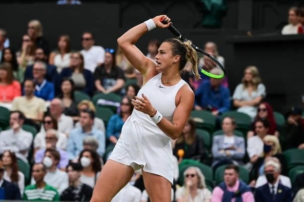 Aryna Sabalenka of Belarus hits a forehand against Ons Jabeur of Tunisia in the quarter finals of the ladies singles during Day Eight of The...