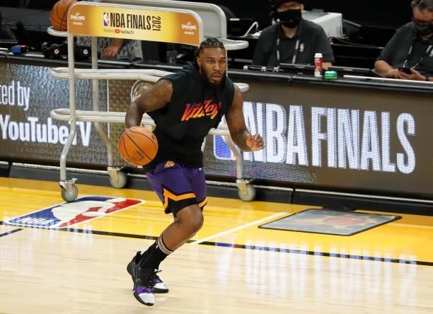 Jae Crowder of the Phoenix Suns warms up before Game One of the NBA Finals against the Milwaukee Bucks at Phoenix Suns Arena on July 06, 2021 in...