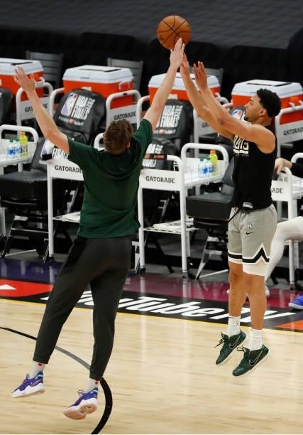 Bryn Forbes of the Milwaukee Bucks warms up before Game One of the NBA Finals against the Phoenix Suns at Phoenix Suns Arena on July 06, 2021 in...