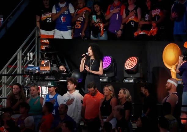 Singer Judith Hill sings the national anthem before the start of Game One of the NBA Finals between the Milwaukee Bucks and the Phoenix Suns at...