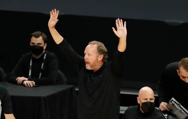 Head coach Mike Budenholzer of the Milwaukee Bucks reacts against the Phoenix Suns during the first quarter in Game One of the NBA Finals at Phoenix...