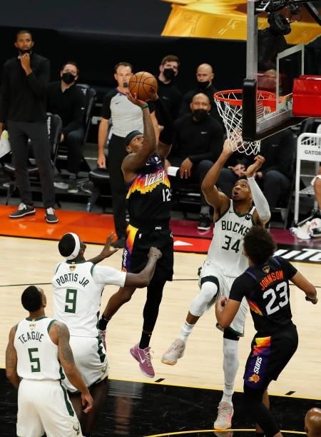 Torrey Craig of the Phoenix Suns goes up for a shot against the Milwaukee Bucks during the first half in Game One of the NBA Finals at Phoenix Suns...