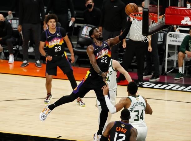 Langston Galloway of the Phoenix Suns goes up for a shot against Giannis Antetokounmpo of the Milwaukee Bucks during the first half in Game One of...