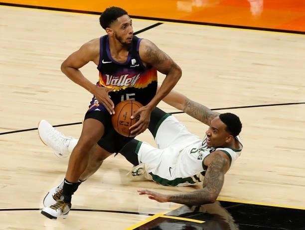 Cameron Payne of the Phoenix Suns drives to the basket against Jeff Teague of the Milwaukee Bucks during the first half in Game One of the NBA Finals...