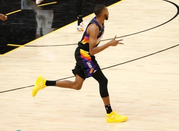 Mikal Bridges of the Phoenix Suns celebrates a three point basket against the Milwaukee Bucks during the first half in Game One of the NBA Finals at...