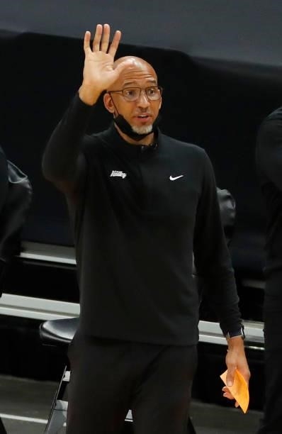 Head coach Monty Williams of the Phoenix Suns signals against the Milwaukee Bucks during the first half in Game One of the NBA Finals at Phoenix Suns...