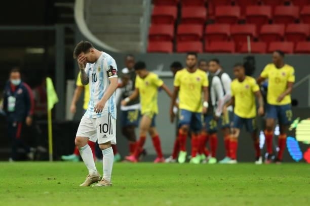 Lionel Messi of Argentina reacts after the first goal of Colombia during a semi-final match of Copa America Brazil 2021 between Argentina and...