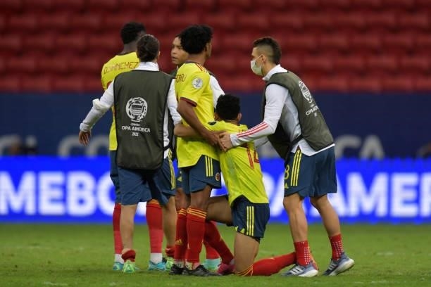 Juan Cuadrado, Luis Diaz and Rafael Santos Borre of Colombia react after losing a penalty shootout after a semi-final match of Copa America Brazil...