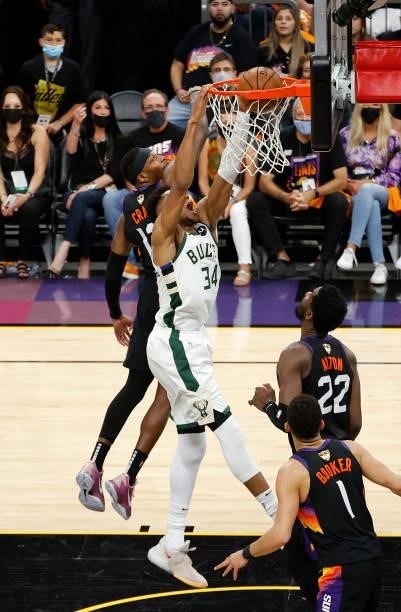 Giannis Antetokounmpo of the Milwaukee Bucks dunks against the Phoenix Suns during the first half in Game One of the NBA Finals at Phoenix Suns Arena...