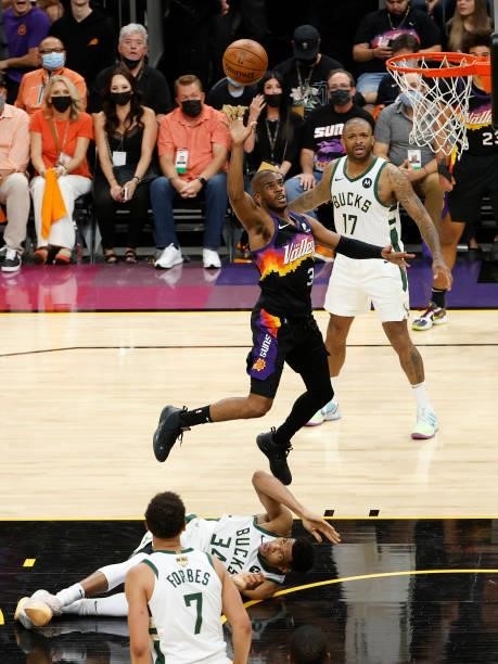 Chris Paul of the Phoenix Suns goes up for a shot against the Milwaukee Bucks during the second half in Game One of the NBA Finals at Phoenix Suns...