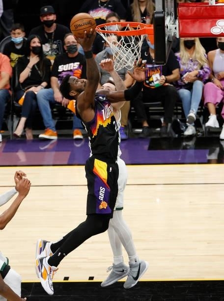 Deandre Ayton of the Phoenix Suns goes up for a shot against the Milwaukee Bucks during the second half in Game One of the NBA Finals at Phoenix Suns...