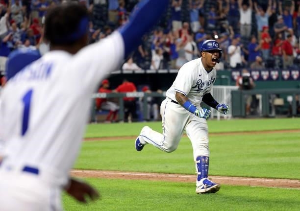 Salvador Perez of the Kansas City Royals reacts as he hits the game-winning single to defeat the Cincinnati Reds 7-6 and win the game in the bottom...
