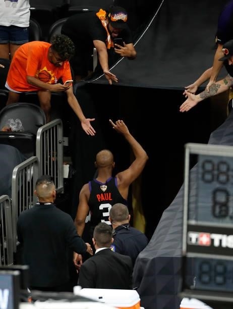 Chris Paul of the Phoenix Suns leave the court after the team's win against the Milwaukee Bucks in Game One of the NBA Finals at Phoenix Suns Arena...