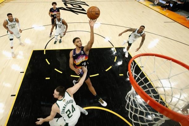 Cameron Payne of the Phoenix Suns puts up a shot over Pat Connaughton of the Milwaukee Bucks during the first half of game one of the NBA Finals at...